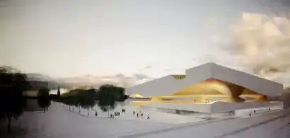 Bâtiment moderne aux lignes angulaires dans un paysage urbain.